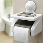 Tissue holder with suction