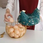 Gold egg holder with chicken cover