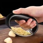 Stainless steel garlic crusher