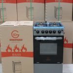 Four burner standing gas cooker with electric oven