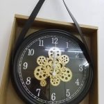 Moving gear wall clock