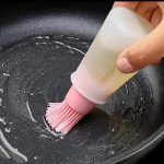 Oil dispenser with brush