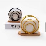 Metallic serviette holder with bamboo base