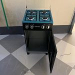Electromate standing cooker with gas compartment